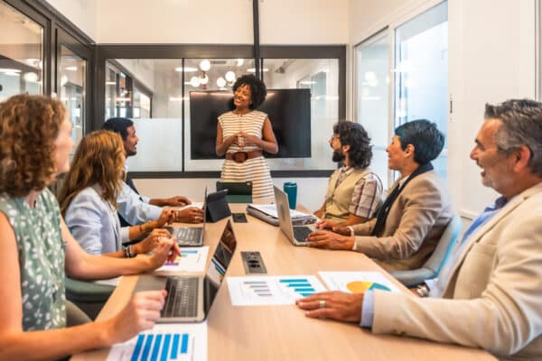 diverse business team collaborating during office meeting